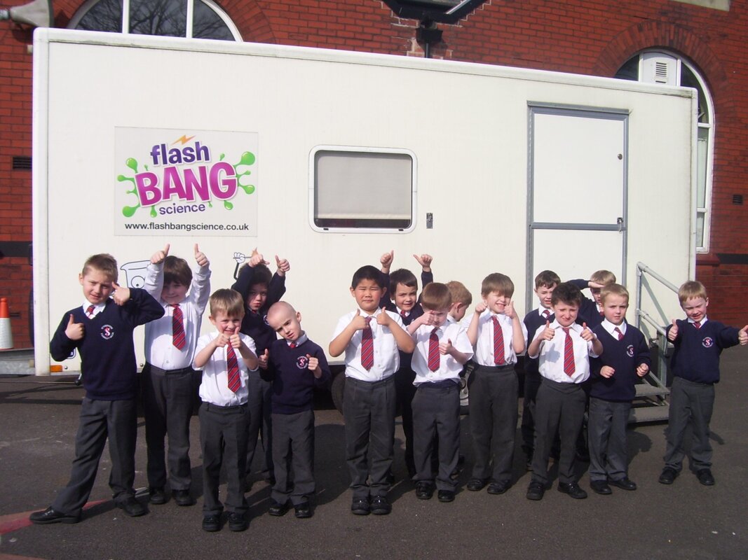 Image of Boys on the Flash Bang Experimentation Science Bus.